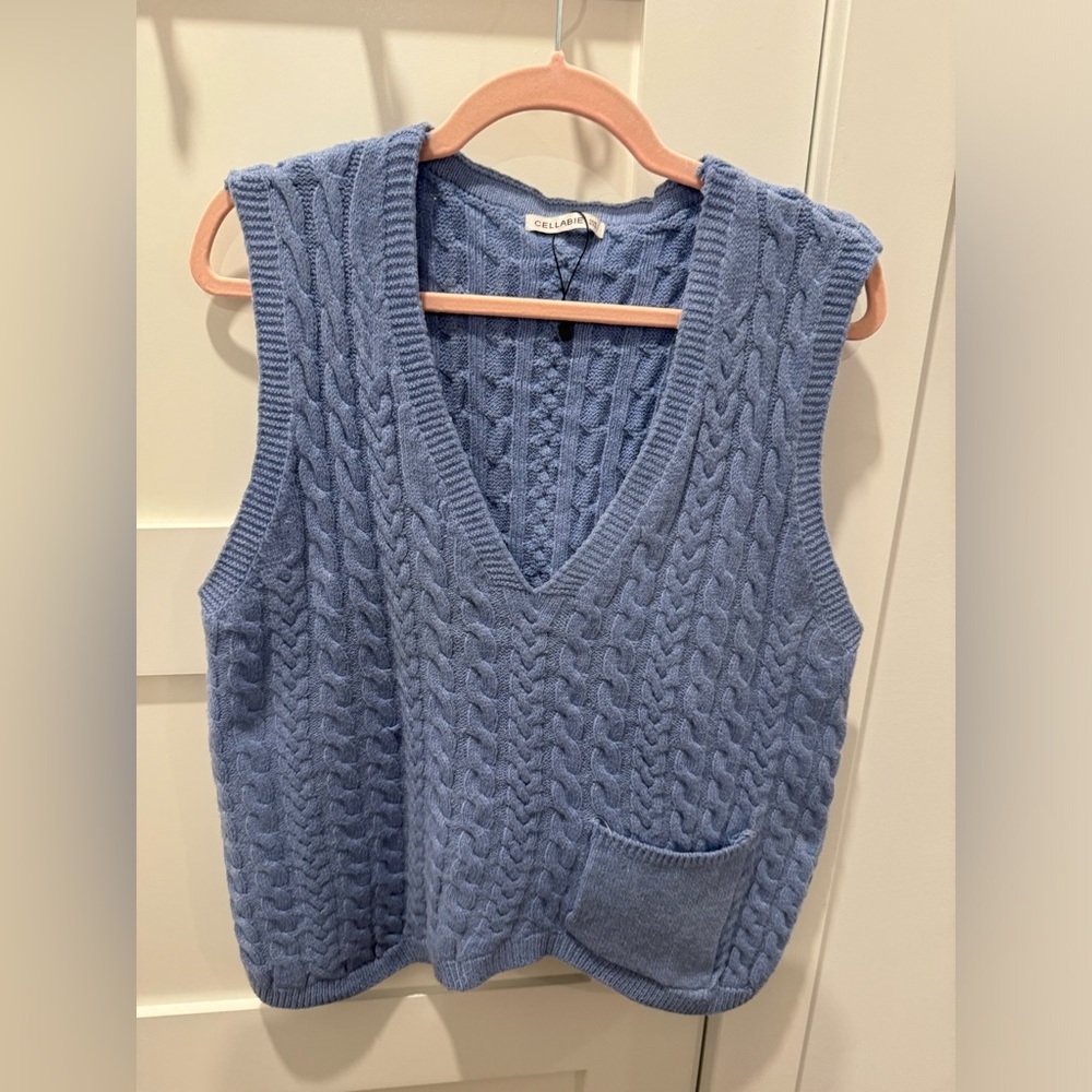 Cute knitted vest.